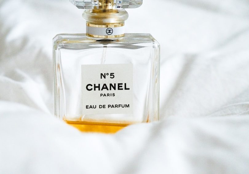 N5 Chanel fragrance bottle on white surface